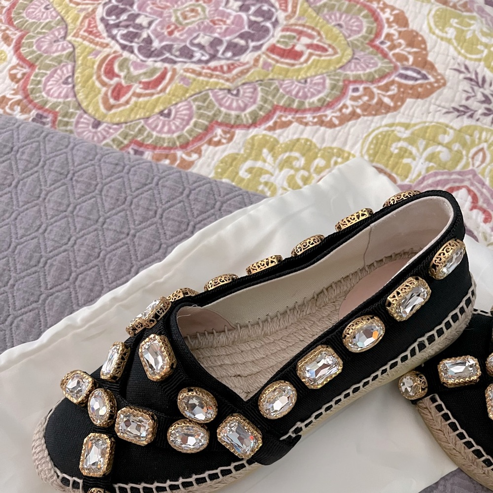 Black Gucci espadrilles ready for summer, never worn. Wear with everything.